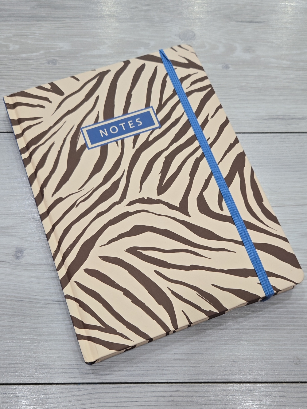 Beige and Brown Zebra Print Notebook with Blue Elastic Closure